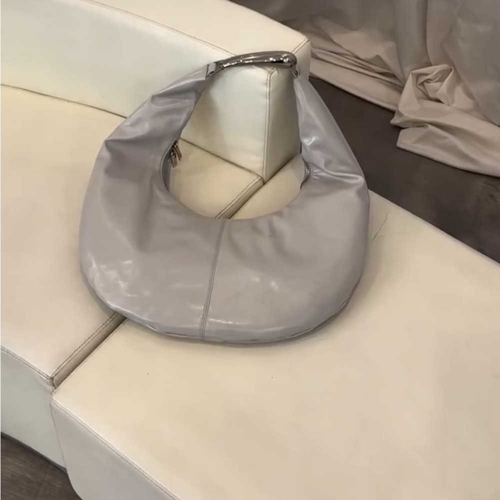 Modern Silver Hobo Bag with Soft Crescent Design